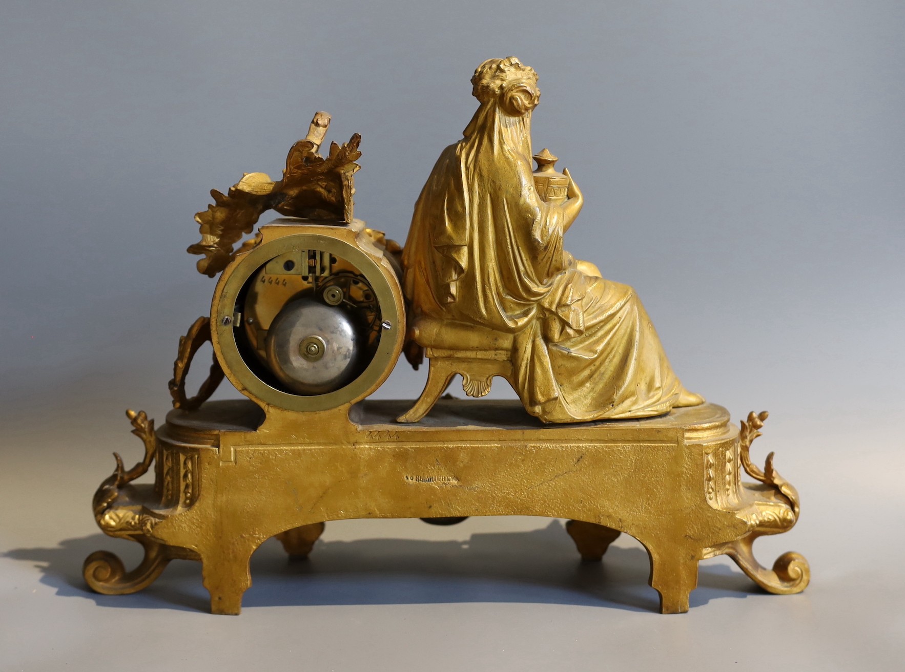 A 19th century French gilt spelter mantel clock, inset oval porcelain panel, height 30cm